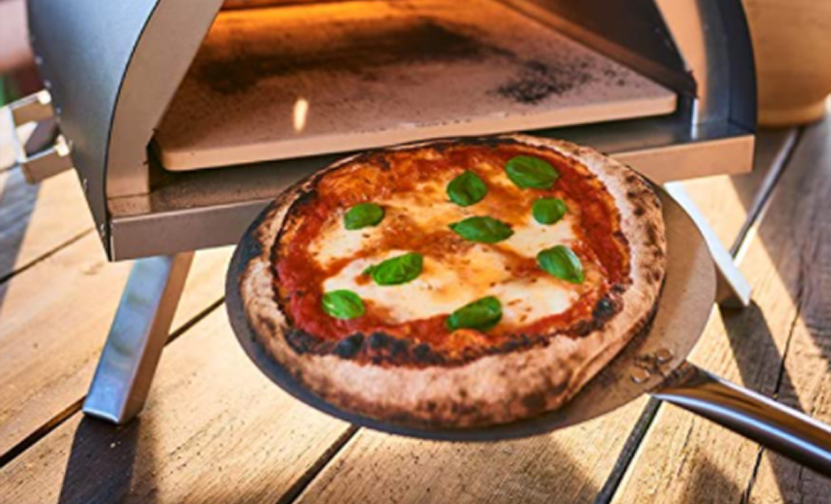 Cos'è e come funziona il fornetto che fa delle pizze perfette in due minuti  - Proiezioni di Borsa